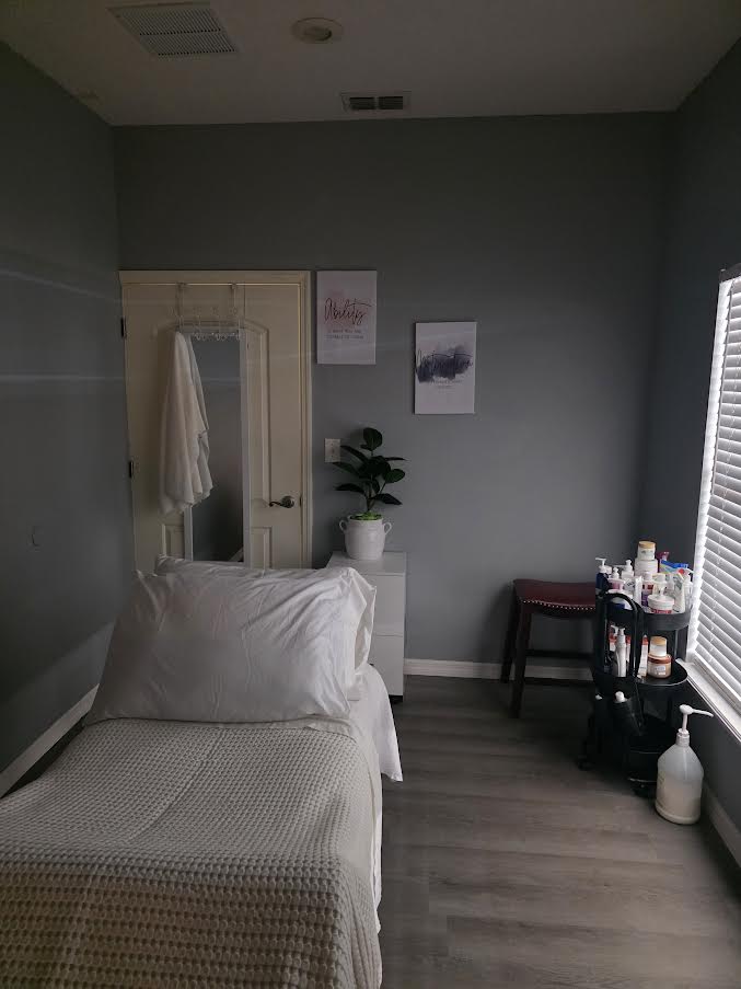 Second treatment room with calming decor and professional supplies